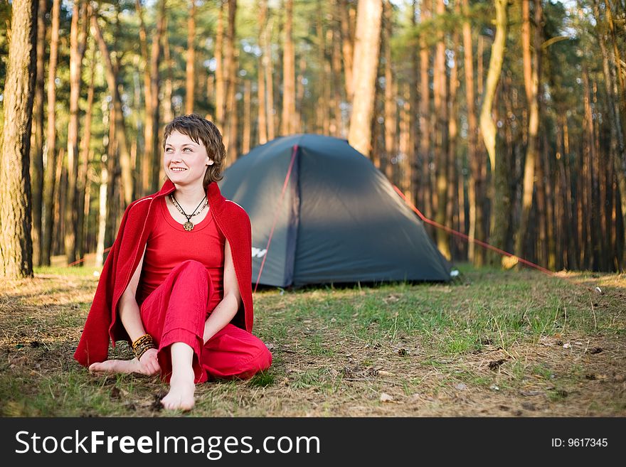 A pretty young woman relaxing in the forest. A pretty young woman relaxing in the forest