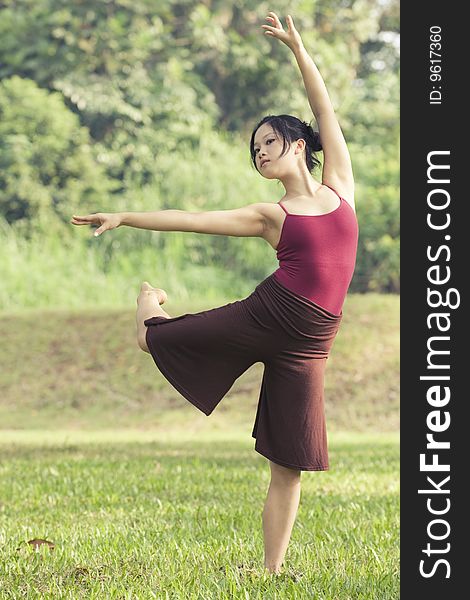 A portrait of asian female ballet dancer outdoor. A portrait of asian female ballet dancer outdoor