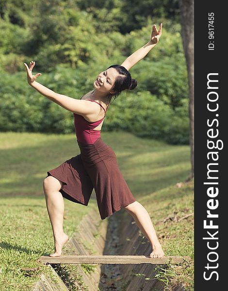 A portrait of asian female ballet dancer outdoor. A portrait of asian female ballet dancer outdoor