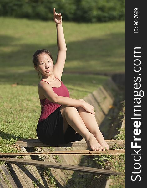 A portrait of asian female ballet dancer outdoor. A portrait of asian female ballet dancer outdoor