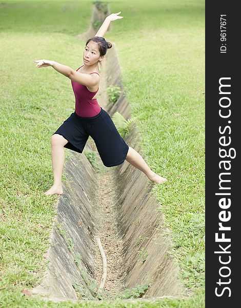 A portrait of asian female ballet dancer outdoor. A portrait of asian female ballet dancer outdoor