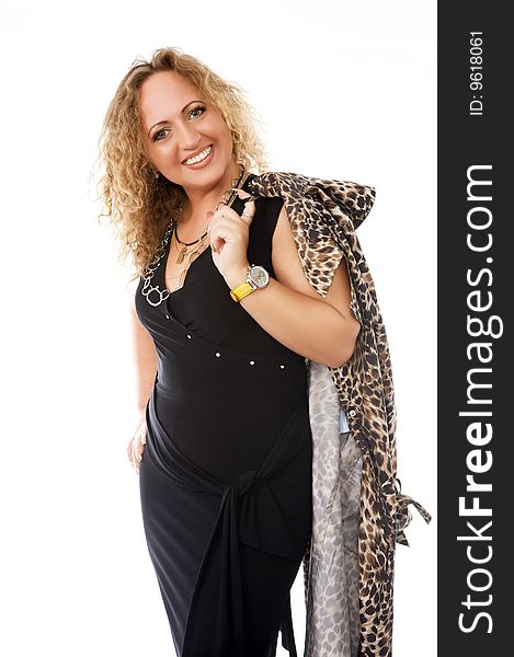 Middleaged smiling woman posing on white background with a leopard coat