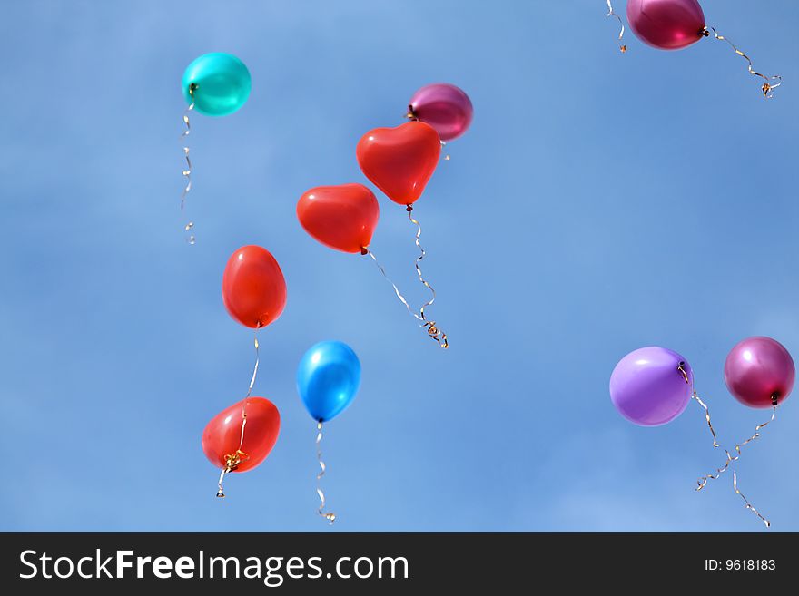 Colorful  balloons floating in the sky