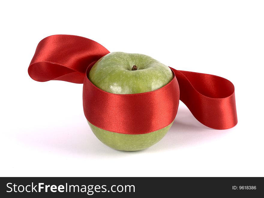 Apple with red ribbon to ninja. Apple with red ribbon to ninja