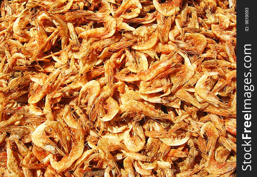A background of sun dried prawns, a cuisine in Indian. A background of sun dried prawns, a cuisine in Indian