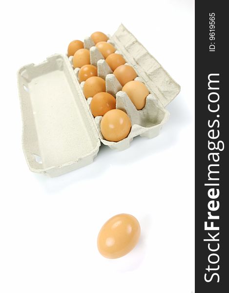 Free range eggs isolated against a white background