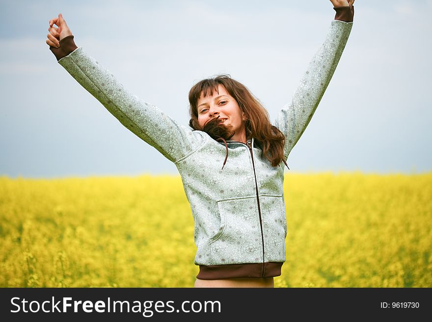 Happy Girl In Flower Field