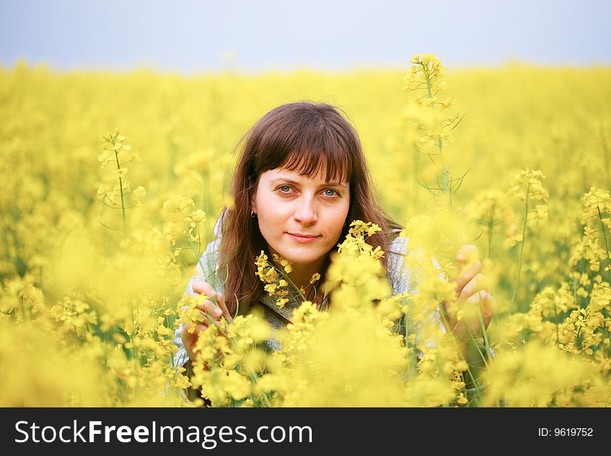 Beauty Woman In Flower Field