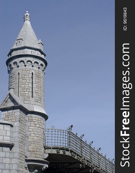 Stone tower on the railroad bridge into the Antwerp central station