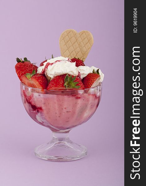 Ice cream with strawberries, fruity ice in a bowl with cream