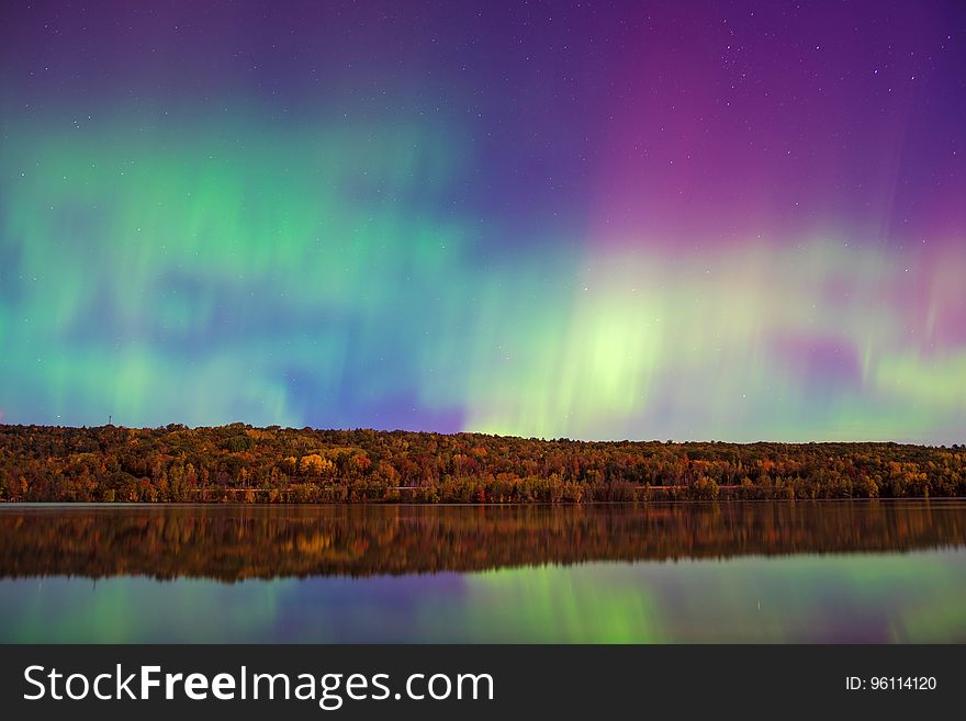 Colorful auroras on the sky at night. Colorful auroras on the sky at night.
