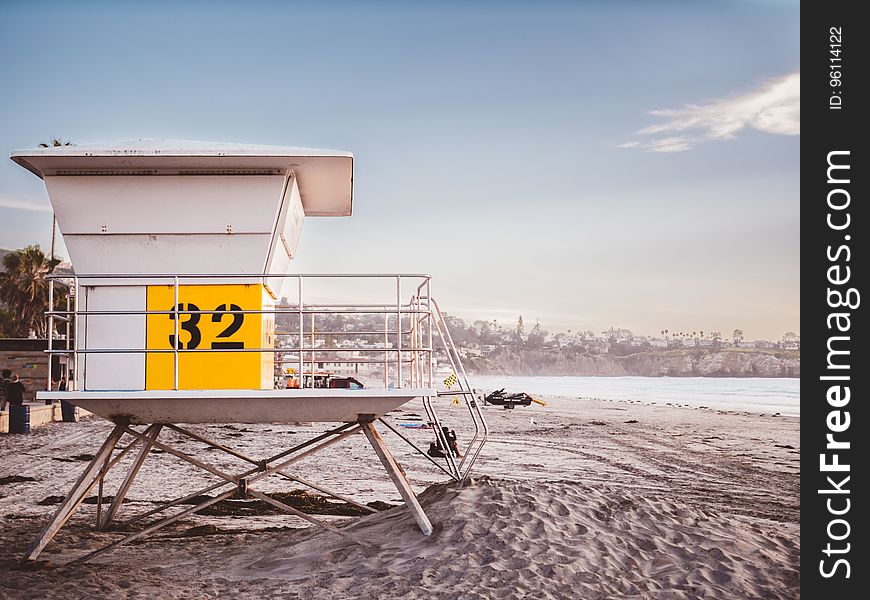 An empty beach with the lifeguard tower. An empty beach with the lifeguard tower.