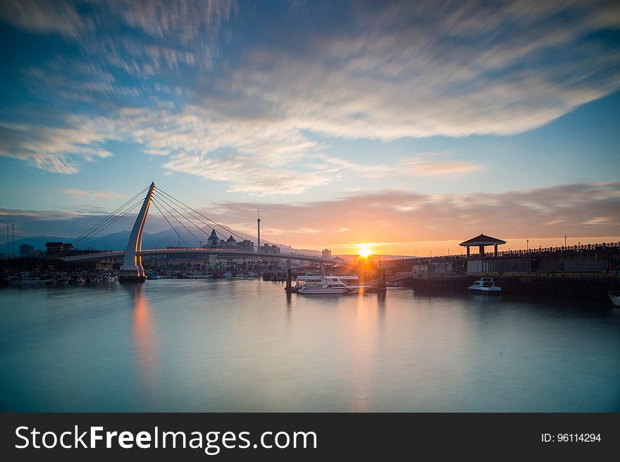 Lover Bridge of Fisherman's Wharf in Tamsui District, New Taipei City, Taiwan at sunset. Lover Bridge of Fisherman's Wharf in Tamsui District, New Taipei City, Taiwan at sunset.