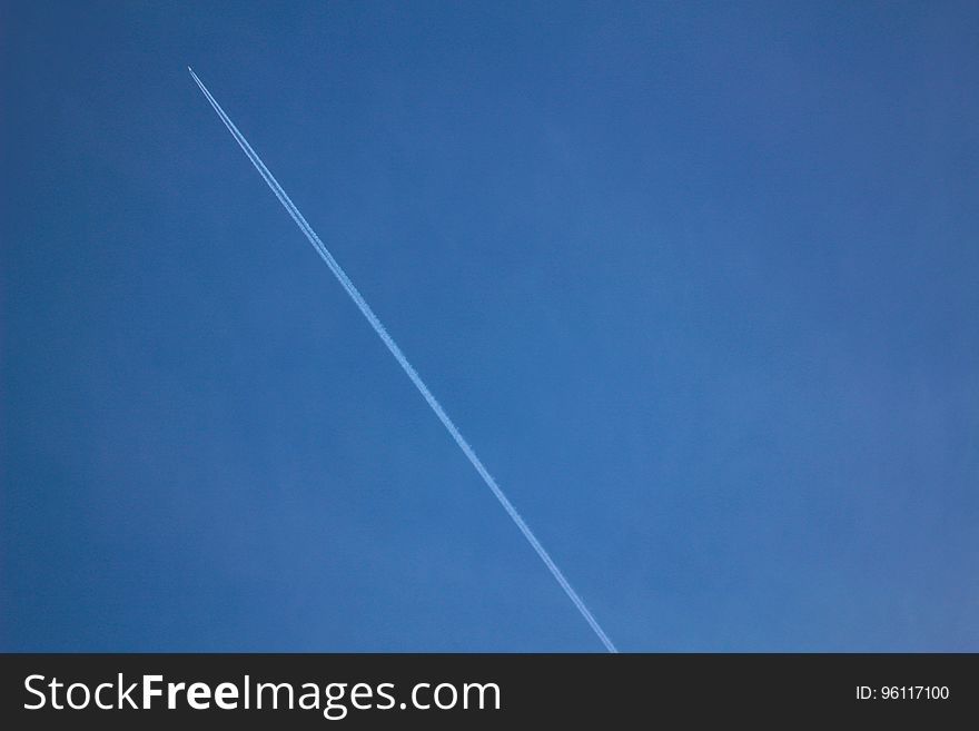 Aircraft Passed on Blue Sky during Daytime