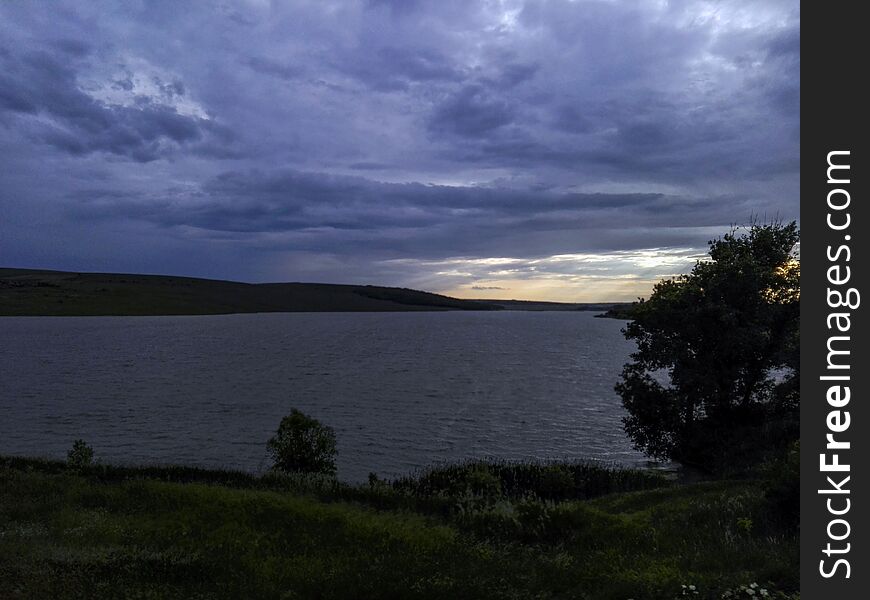 Lake versus rainy day. Location: Iasi, Romania.