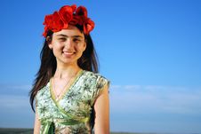 Girl On A Red Poppies Field Royalty Free Stock Photography