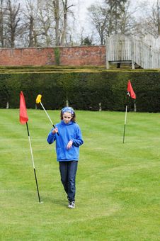 Girl Playing Mini Golf Stock Photo Girl Playing Mini Golf Stock Photo