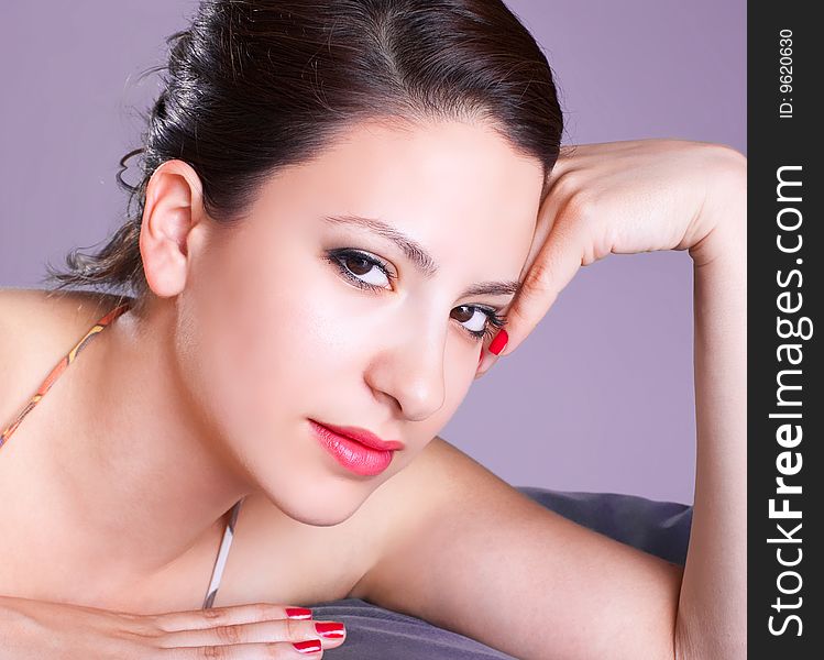 Attractive young fashion model posing , studio shot