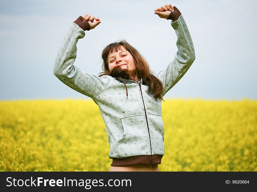 Happy girl in flower field