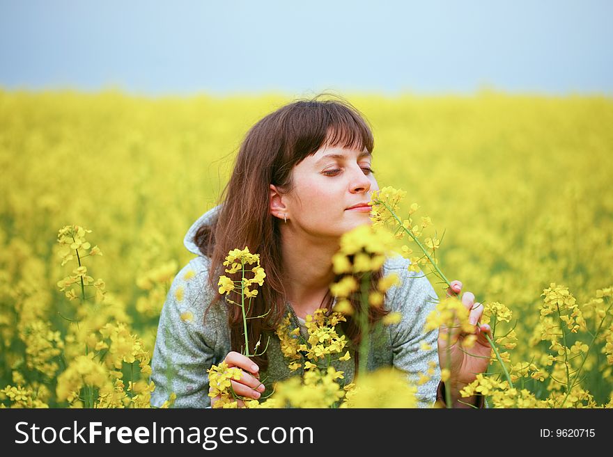 Beauty Woman In Flower Field