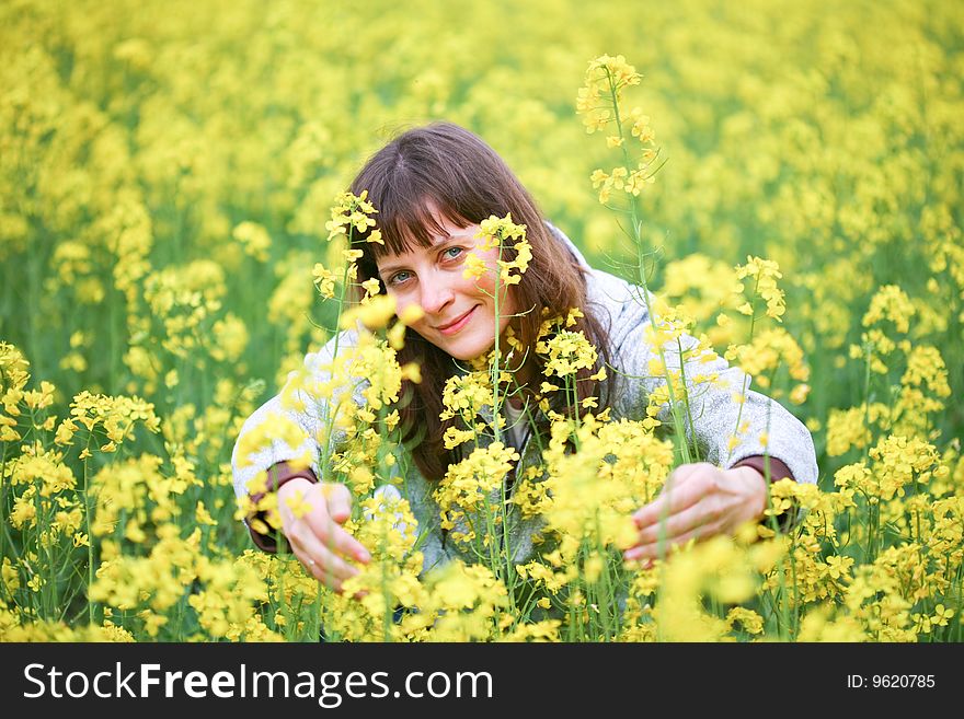 Beautiful woman in flower field. Beautiful woman in flower field