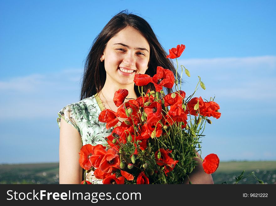 Girl On A Red Poppies Field