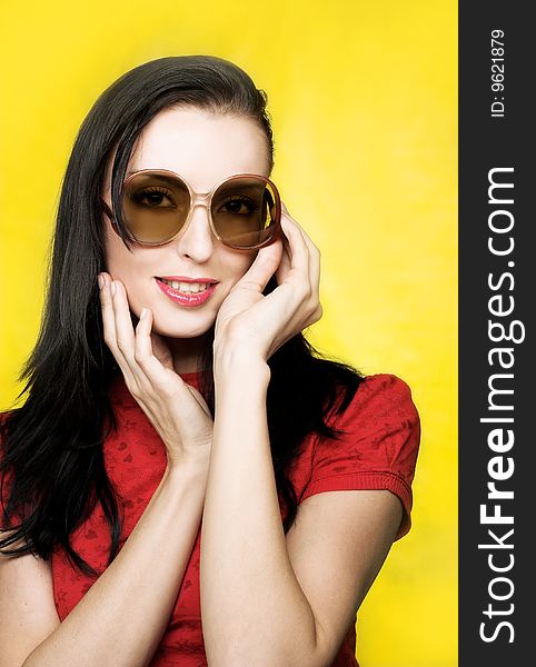 Portrait of young woman in sunglasses in retro style. Portrait of young woman in sunglasses in retro style