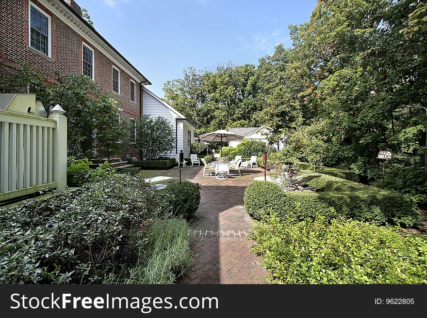 Suburban brick home with patio