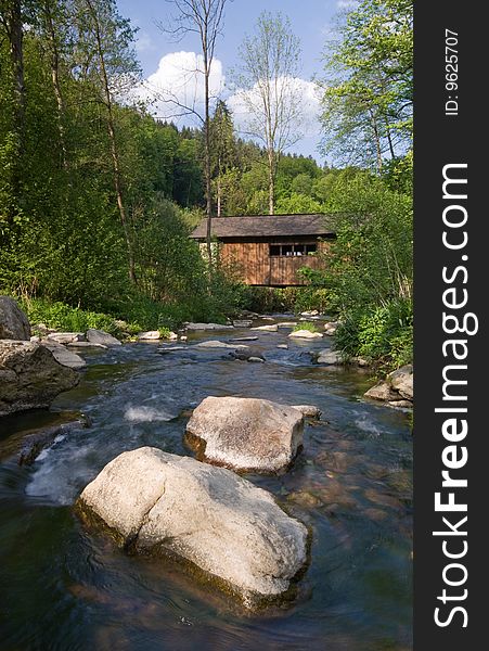 Wood bridge across the river Nedvedicka – Pernstejn, Czech republic.