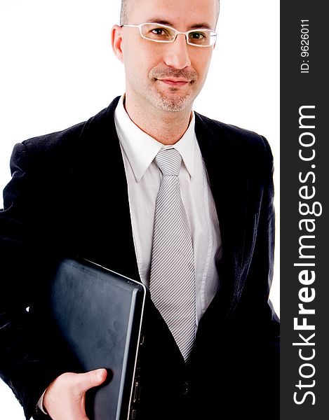 A Businessman holding his laptop. A Businessman holding his laptop