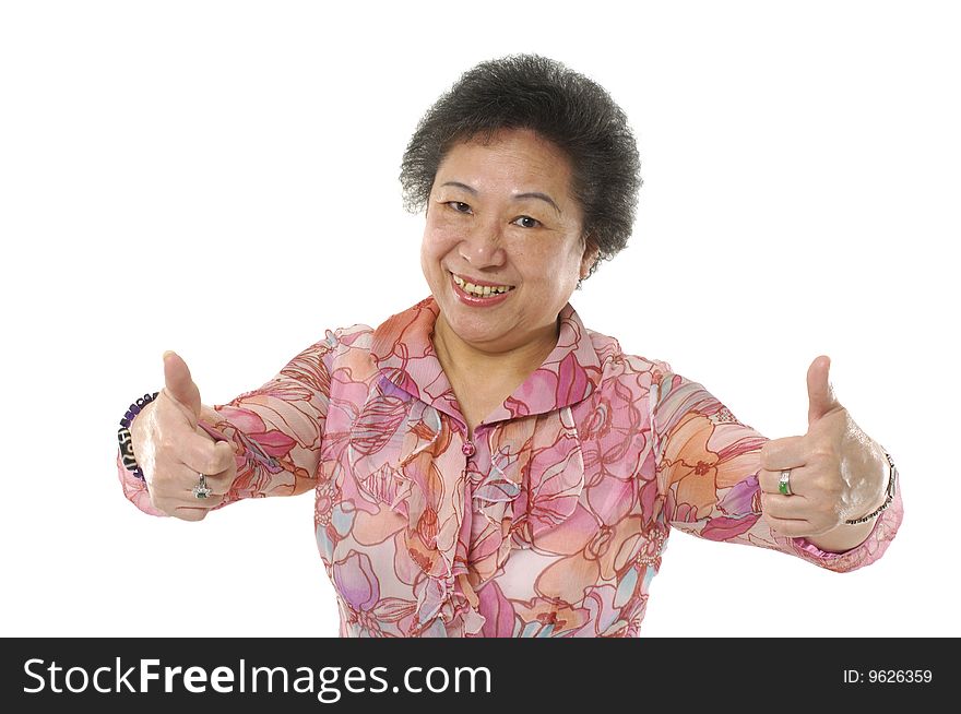 Senior lady giving two thumbs up. Isolated on white. Senior lady giving two thumbs up. Isolated on white