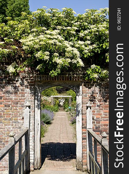 The enterance to the walled garden at Barrington Court Tudor Manor house in Somerset, England. The enterance to the walled garden at Barrington Court Tudor Manor house in Somerset, England