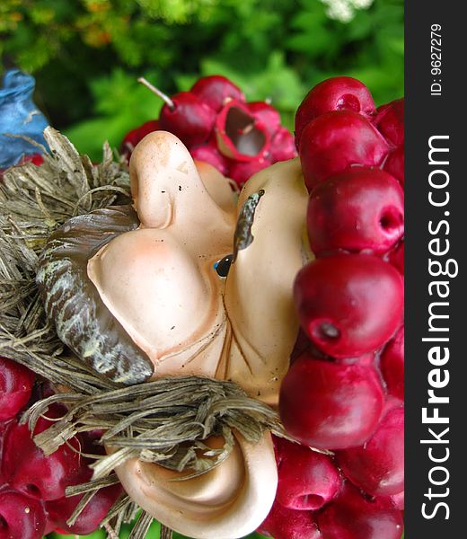 Head of a colorful garden gnome sculpture