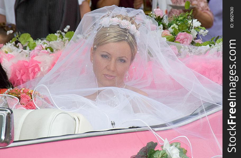 Young Fiancee Sits In A Machine Without A Roof