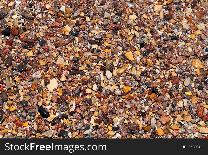 Wet pebbles, natural background texture