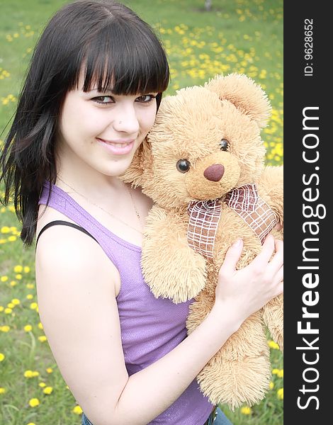 Brunette With Plush Teddy Bear