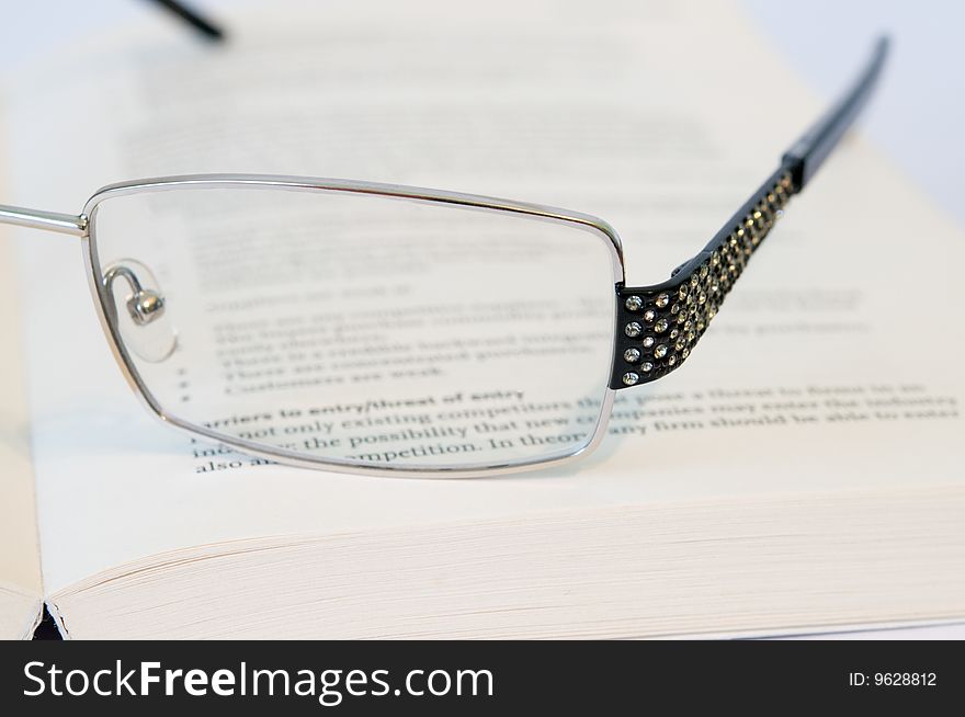 Glasses and book