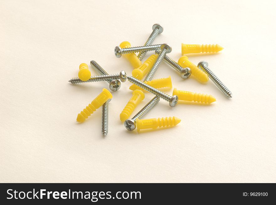 Drywall screws with plastic anchors. Drywall screws with plastic anchors.
