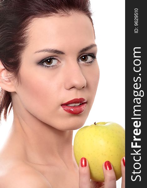 Close-up portrait of young beautiful healthy woman with yellow apple isolated on white. Close-up portrait of young beautiful healthy woman with yellow apple isolated on white