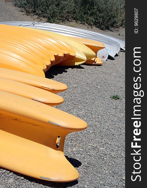 Kayaks lined up on the beach