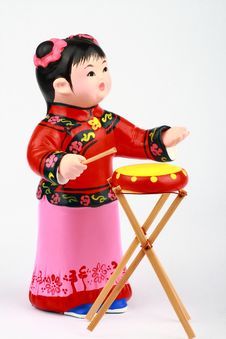 Clay Figure Of Asian Girl Playing Drum Royalty Free Stock Photography