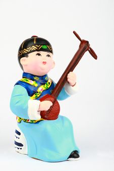 Clay Figure Of Asian Boy Playing Music Royalty Free Stock Photography Clay Figure Of Asian Boy Playing Music Royalty Free Stock Photography