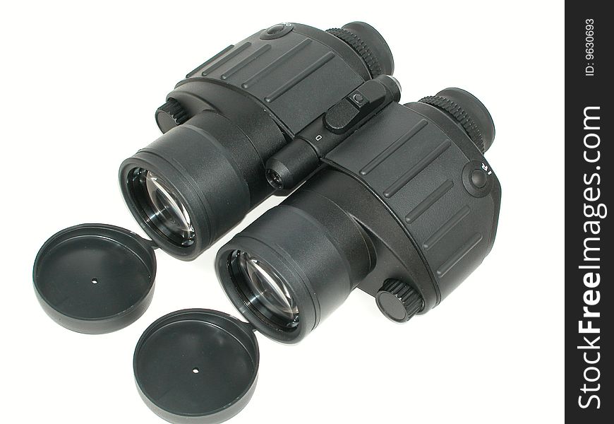 Binoculars. Field-glass with open lids isolated on white.