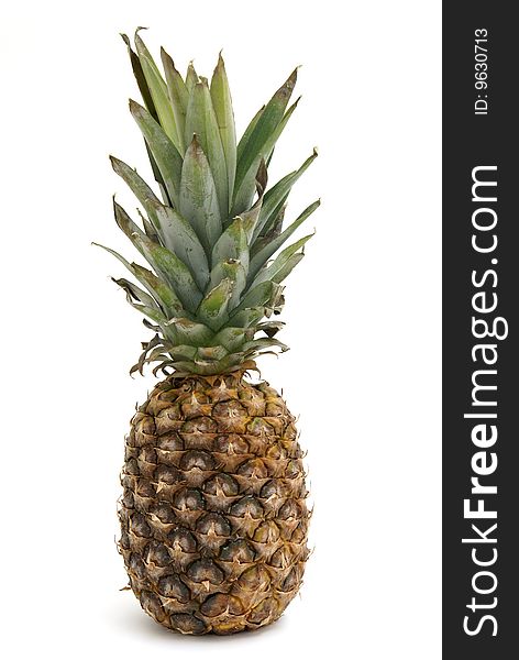 A fresh whole pineapple on white background.