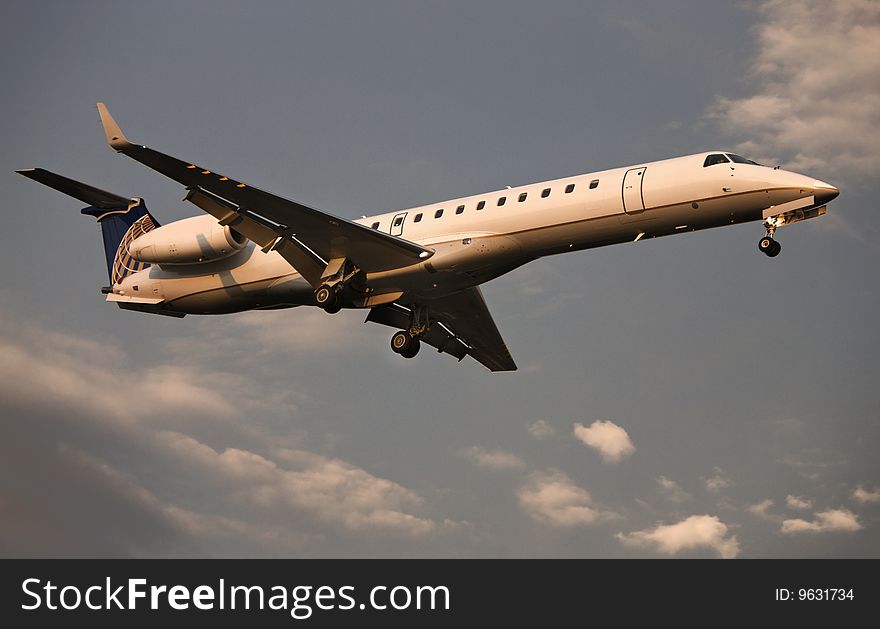 Small passenger jet plane on landing approch. Small passenger jet plane on landing approch