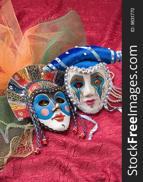 Carnival masks on red fabric. Carnival masks on red fabric