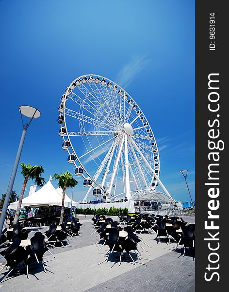 Ferrish wheel image on the sky blue background