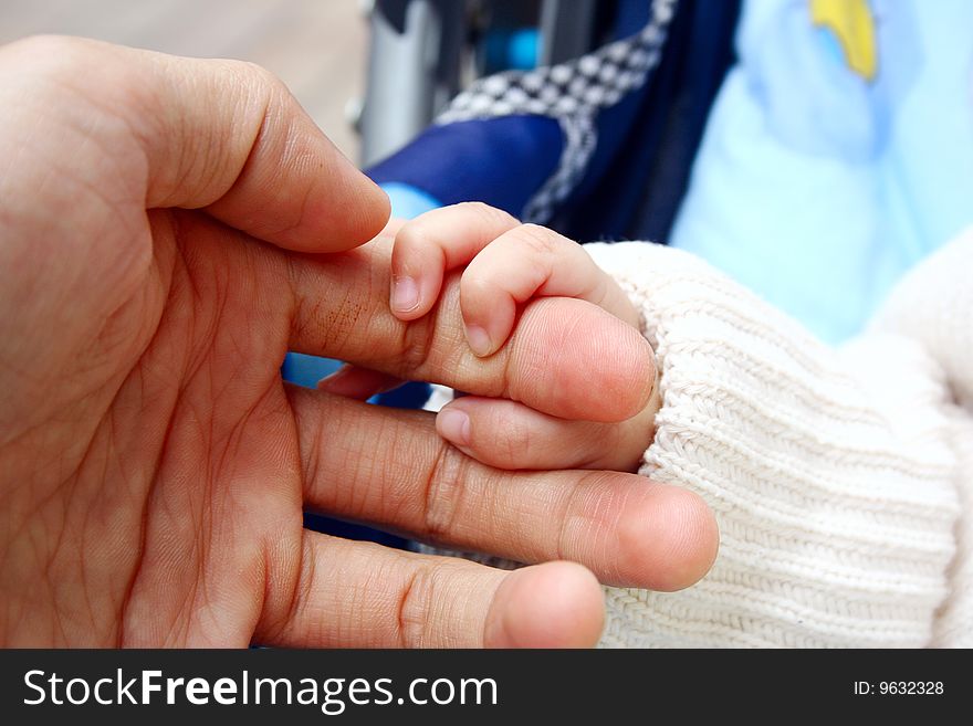 New born Baby's hand gripping for mothers finger. New born Baby's hand gripping for mothers finger