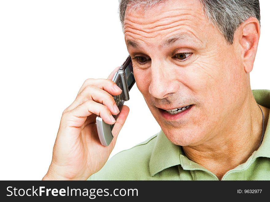 Close-up of a man talking on a mobile phone isolated over white. Close-up of a man talking on a mobile phone isolated over white