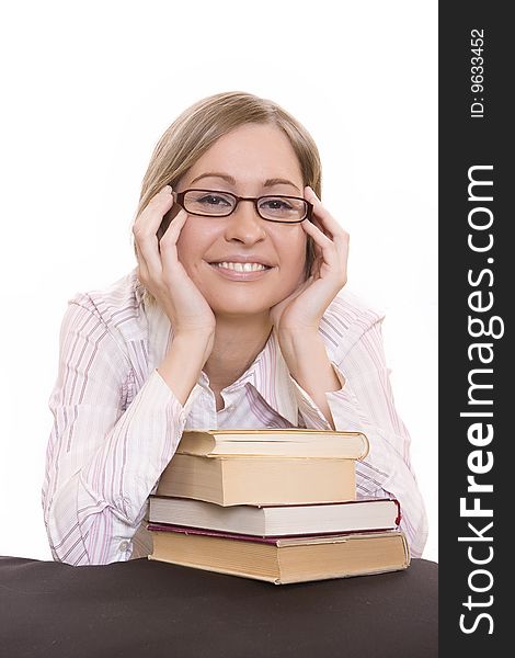 Smiling woman leaning with their elbows on a books. Smiling woman leaning with their elbows on a books